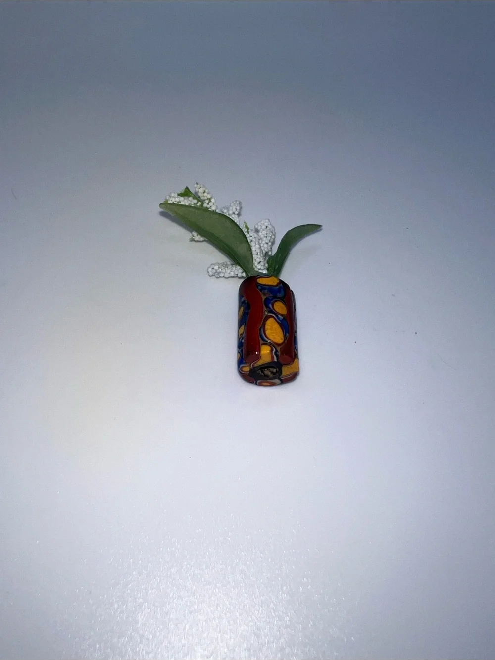 Miniature Decorative Vase with White Floral Spray